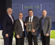 (L to R) Michael Dykes, IDFA president and CEO; Mike Wells, president and CEO, Wells Enterprises; Brian Kraus, director of food safety and regulatory compliance, Wells Enterprises; and John Allan, IDFA vice president. 