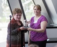 Gina S. Konnick, MS receiving her award  